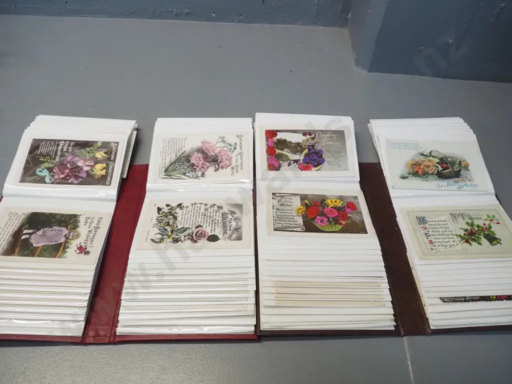 2 albums full of vintage postcards and greeting cards Image 1++