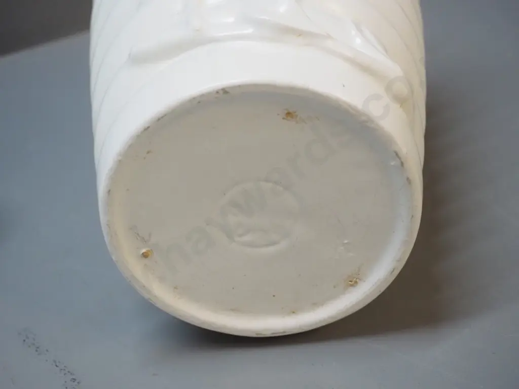white vase with ribbed and raised flower design - hard to read mark on base H-270 Image 1++