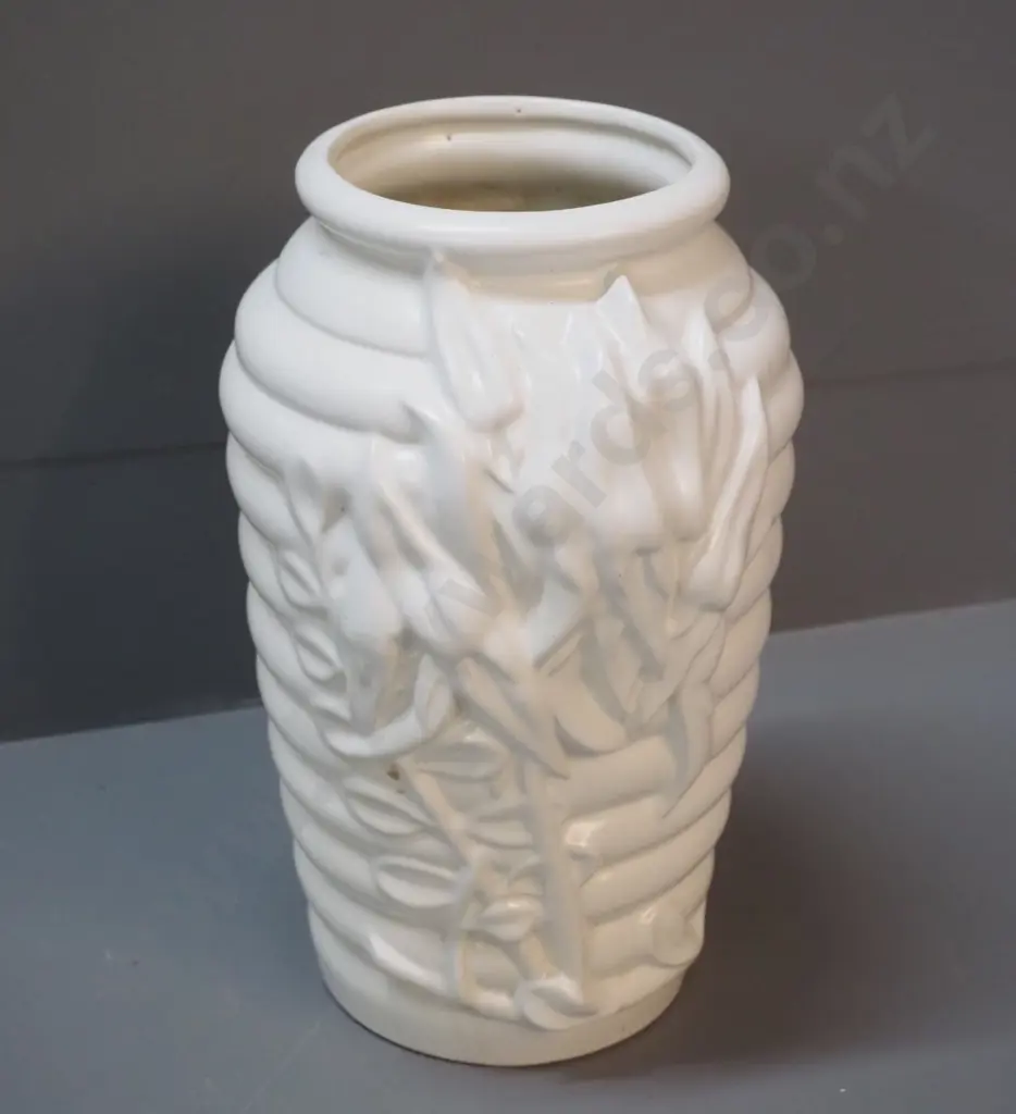 white vase with ribbed and raised flower design - hard to read mark on base H-270 Image 1++