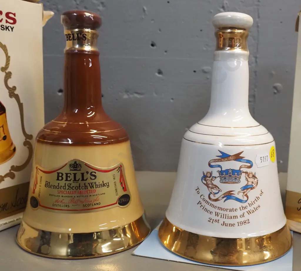 2 sealed 500ml Bell whisky decanters w/boxes: commemorative 1982 Prince William, box of other one in rough shape Image 1++