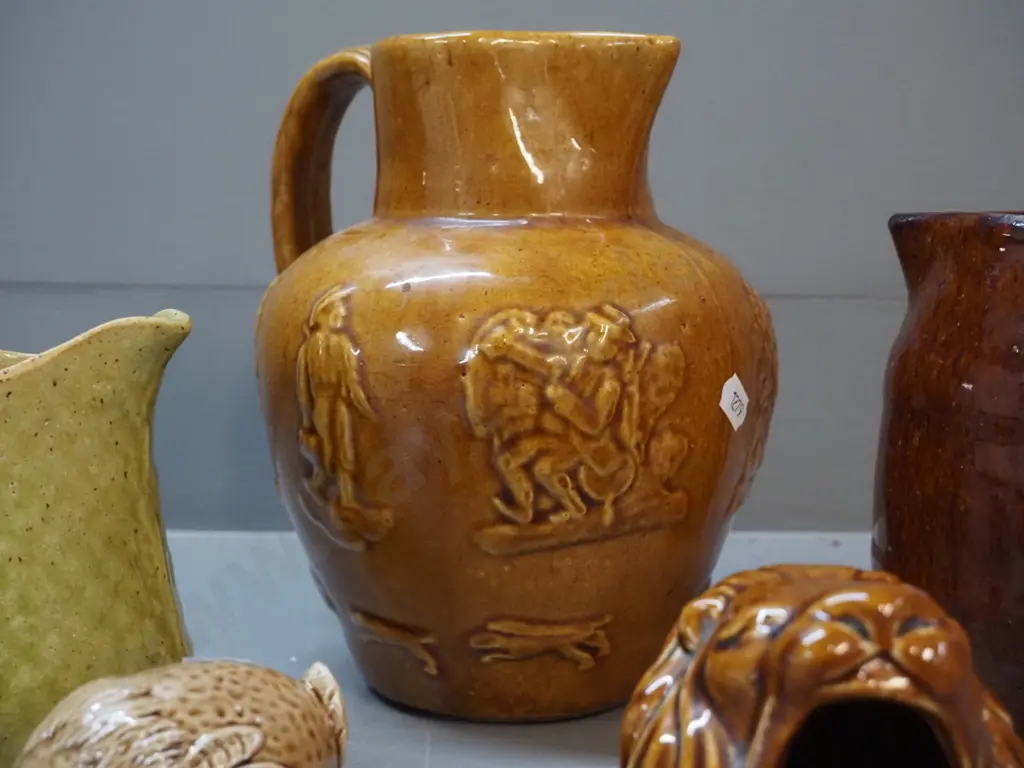 assorted pottery items including lion ashtray, Beswick Beneagles miniature, 3 jugs w/no maker's marks - largest is H-210 Image 1++
