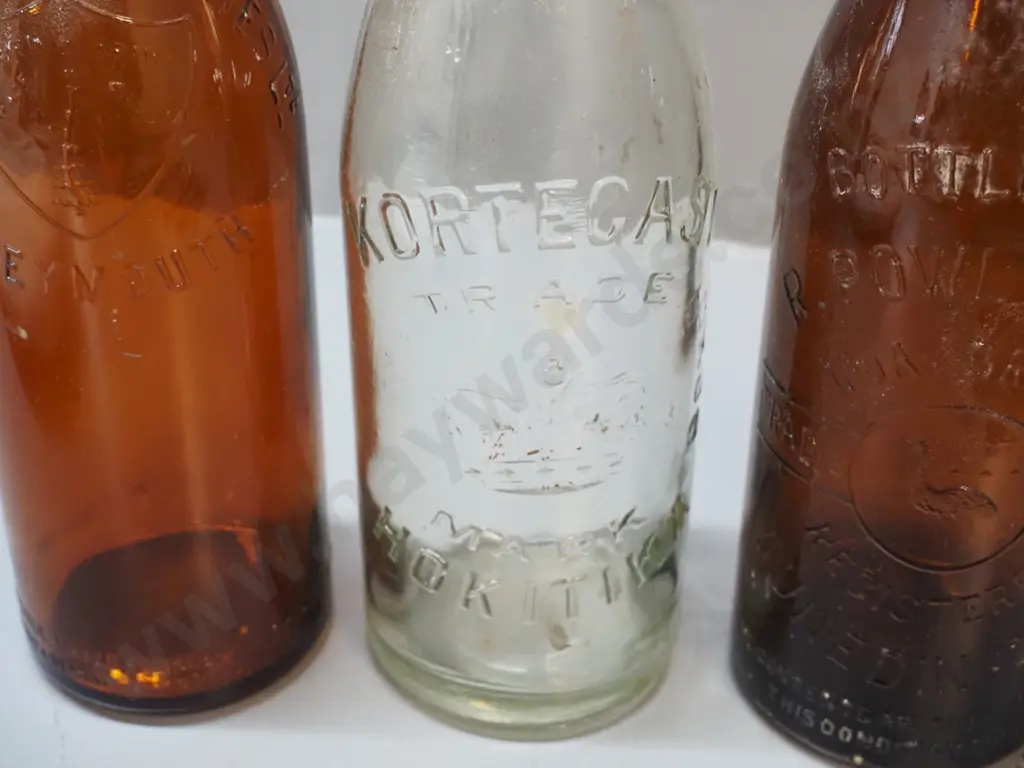 3 vintage beer bottles - clear Kortegast Bros. Hokitika H300 and brown Westland Breweries and Powley & Co. Moa Dunedin Image 1++