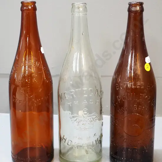 3 vintage beer bottles - clear Kortegast Bros. Hokitika H300 and brown Westland Breweries and Powley & Co. Moa Dunedin