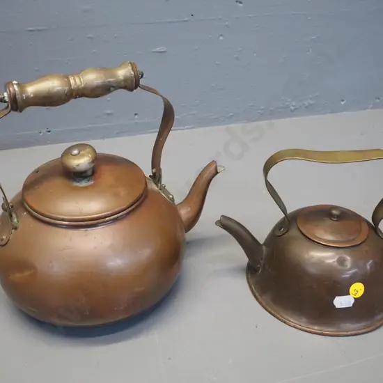 2 vintage small copper kettles, one w/brass handle, one w/wooden handle H220 W-230, both have minor denting