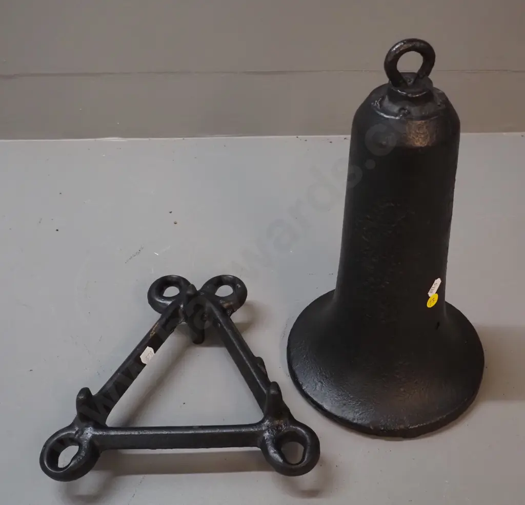 heavy gauge cast iron bell-shaped object with hanging loop and hole drilled H350 and a triangular frame with eyelets Image 1++