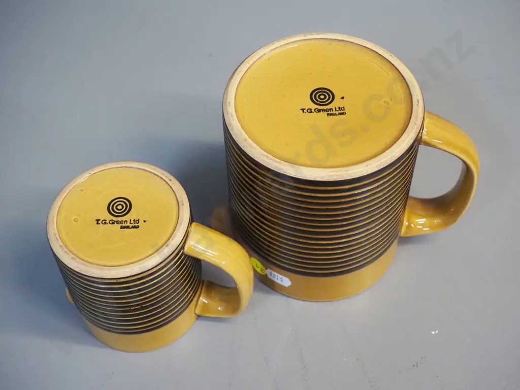 2 T&G Greene fine stripe gold and black jugs, larger is H-130 W-160 Image 1++