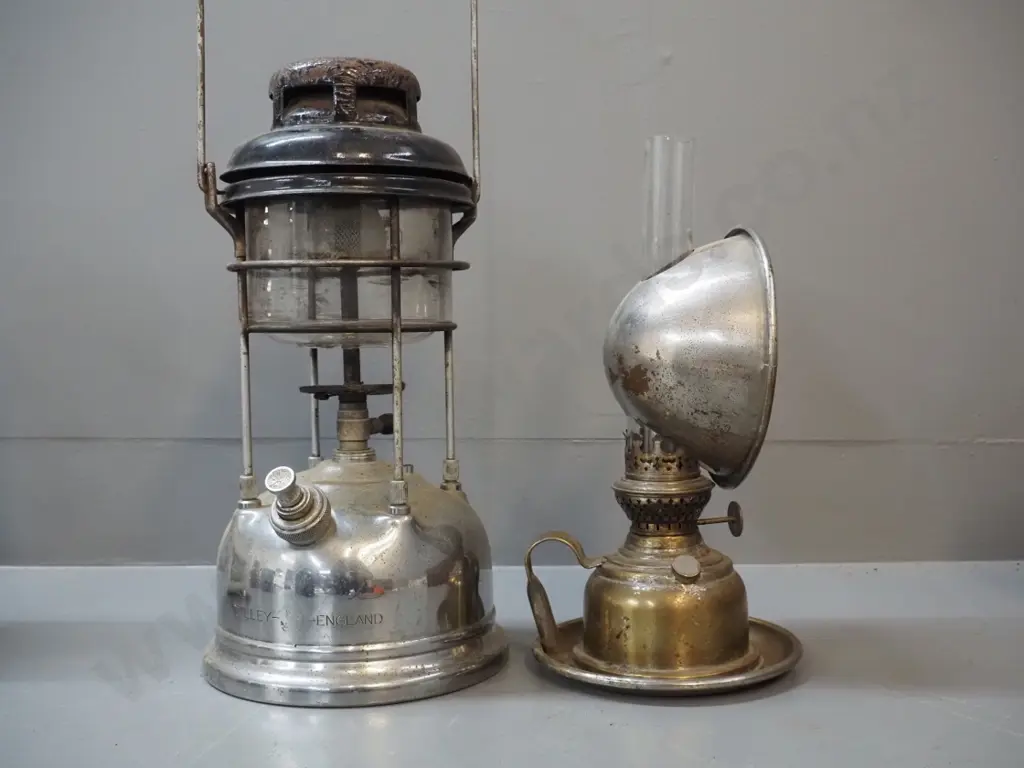 2 spirit lanterns - chrome Tilley England H350 & other w/brass finish & glass chimney, wear & pitting to chrome etc. Image 1++