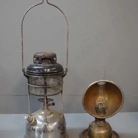 2 spirit lanterns - chrome Tilley England H350 & other w/brass finish & glass chimney, wear & pitting to chrome etc.