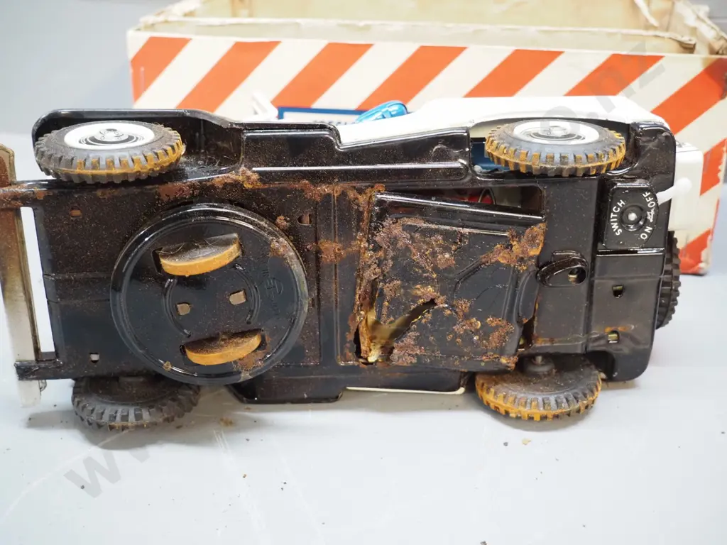 2 vintage Japanese tin toy vehicles - police jeep and tractor with separate driver, box - both with corrosion and damage Image 1++