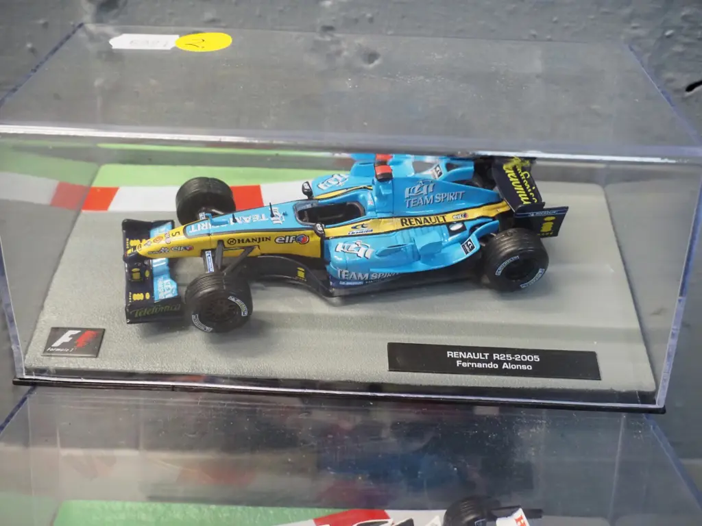 2 die-cast 1:43 scale Formula 1 racing cars - both 2005 - Jenson Button and Fernando Alonso Image 1++