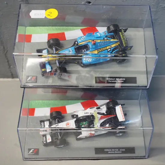 2 die-cast 1:43 scale Formula 1 racing cars - both 2005 - Jenson Button and Fernando Alonso
