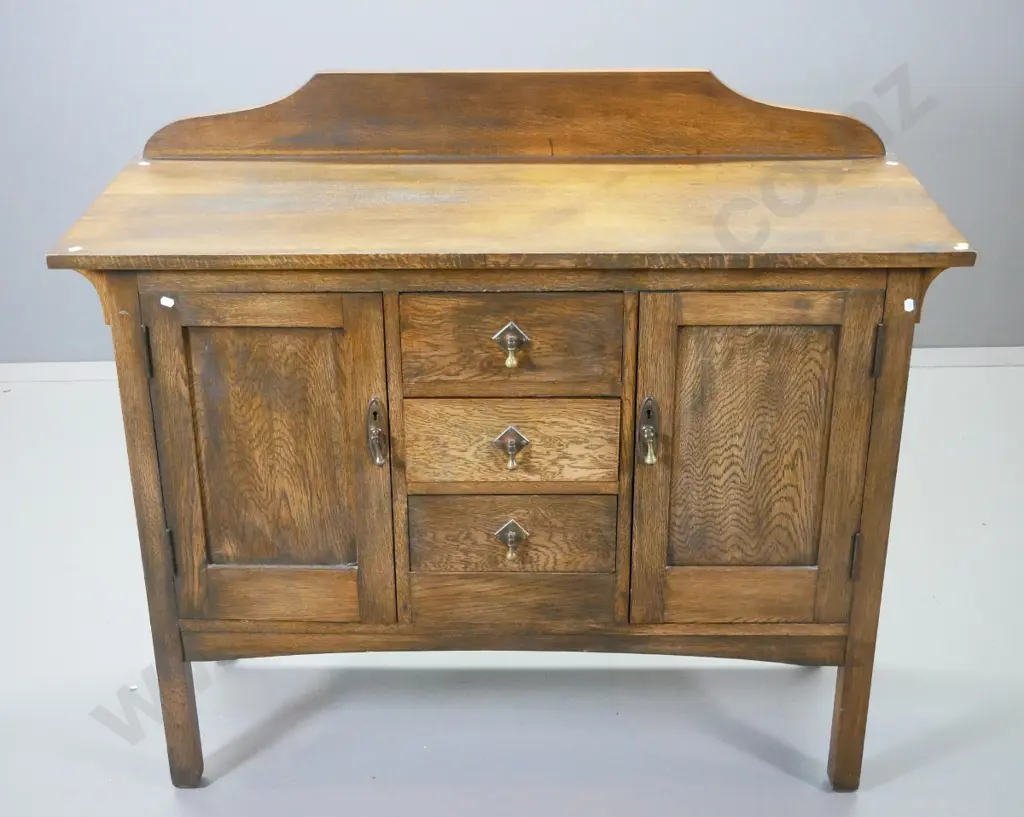 oak deco sideboard w/3 drawers, 2 cupboards, original drop handles, key escutcheons, no key H1060 w1220 D485 Image 1++