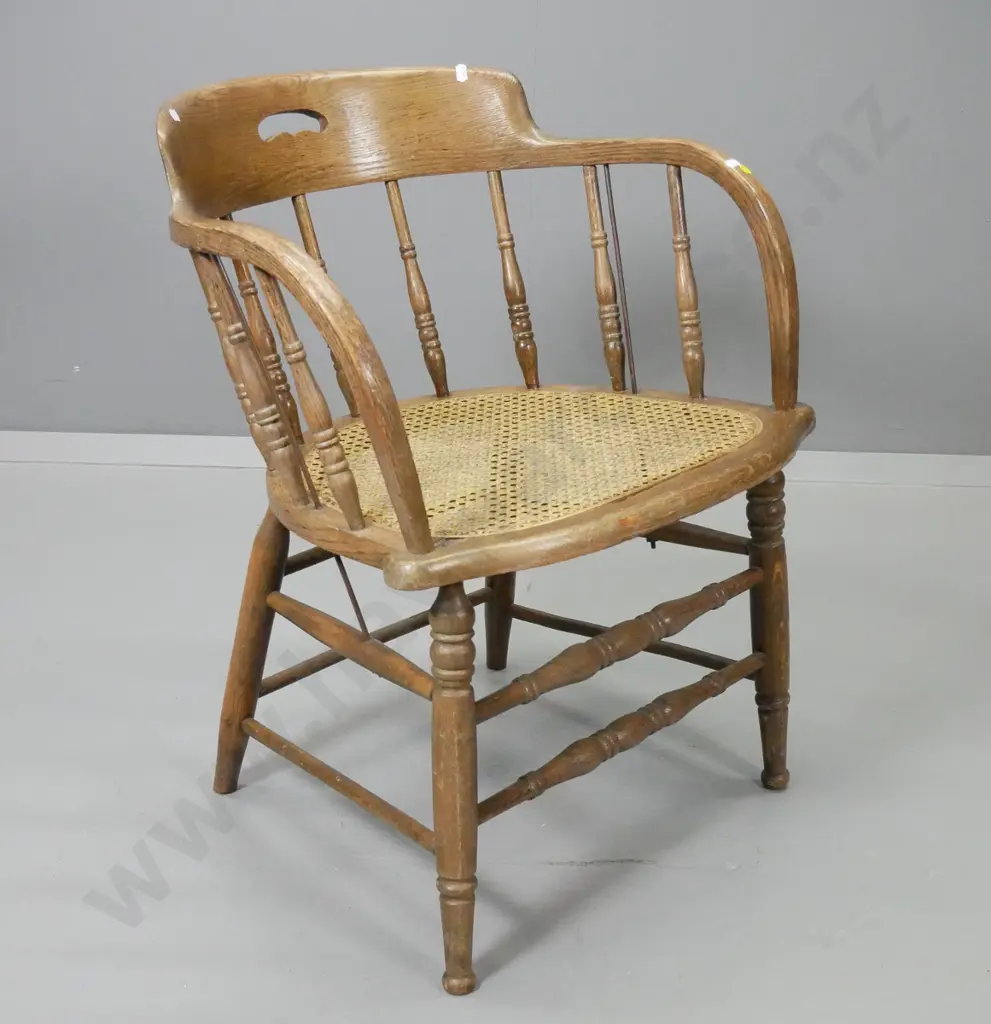 vintage oak captain's chair with bergere cane seat - some damage to timber around cane edge H710 W565 D500 Image 1++