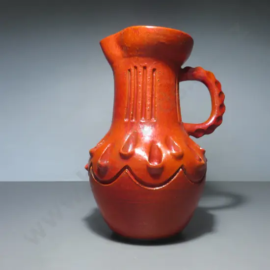 Mid-century heavily carved Italian studio potted pitcher