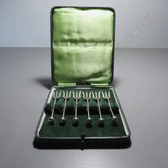 Boxed set of English “trident” three pronged forks