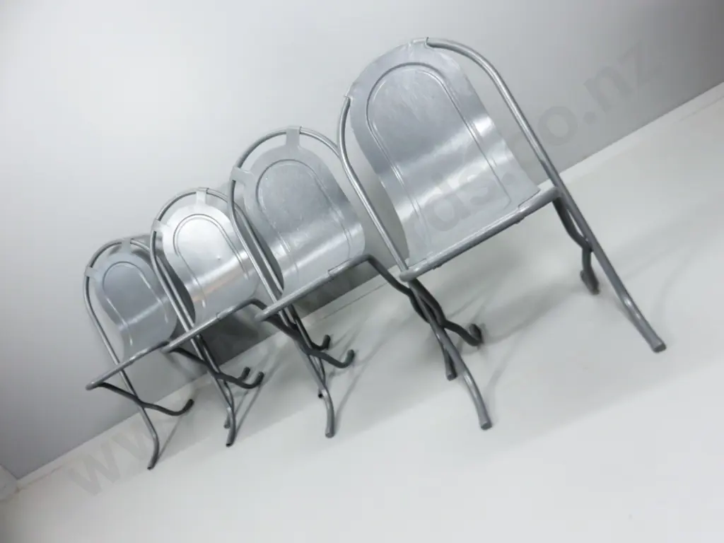 Set of four mid century Sebel “Stak-A-Bye” Chairs Image 1++