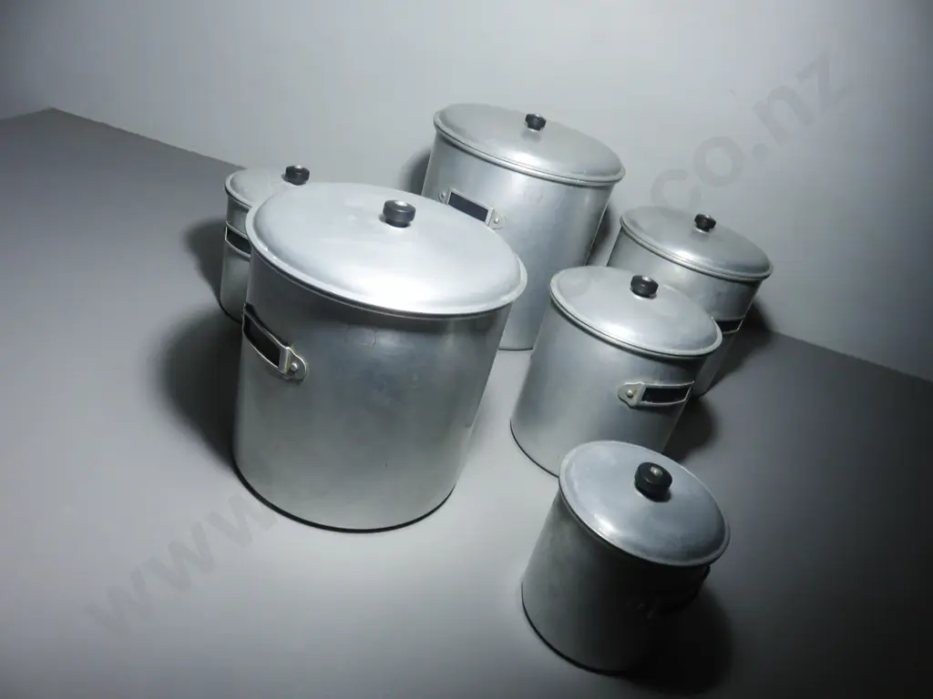 Set of six early to mid-20th century Aluminium kitchen storage Canisters Image 1++