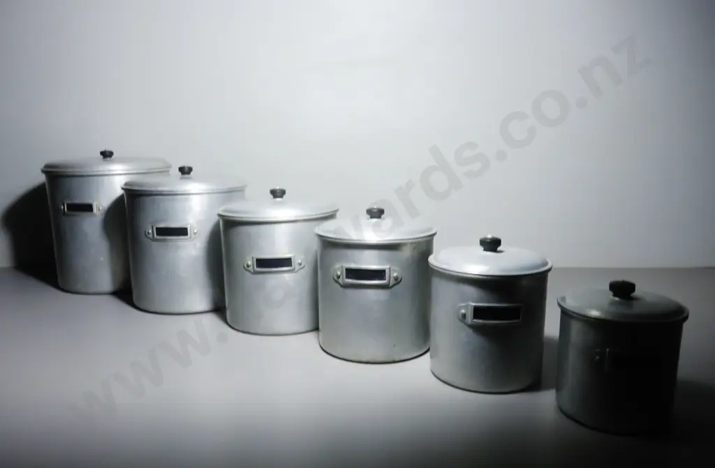 Set of six early to mid-20th century Aluminium kitchen storage Canisters Image 1++