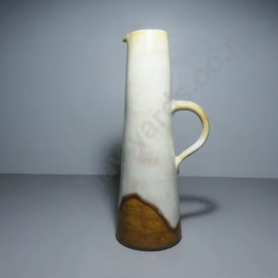 Tall mid-century stylized pitcher from the West German studio of Ceramano