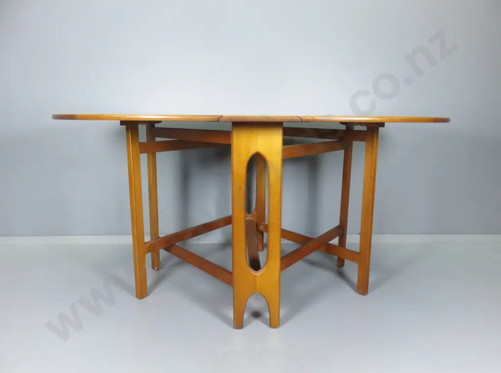 Mid-century gate leg teak dining table Image 1++