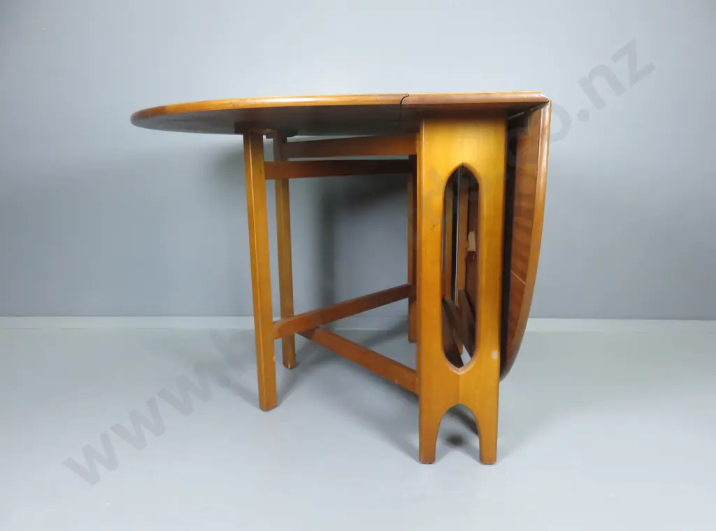 Mid-century gate leg teak dining table Image 1++