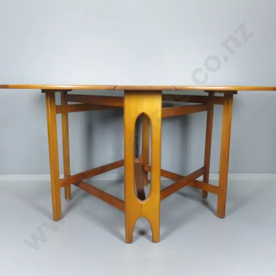 Mid-century gate leg teak dining table