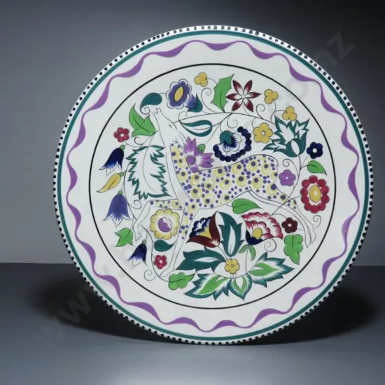 Vintage Poole pottery charger featuring the “Persian deer” pattern