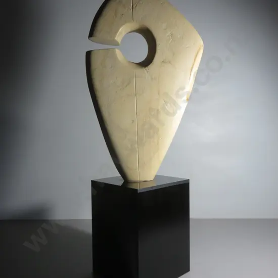 Modernist limestone and black Perspex cubed base sculpture