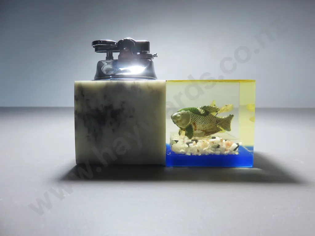 Mid-century table lighter with lucite fish decoration Image 1++