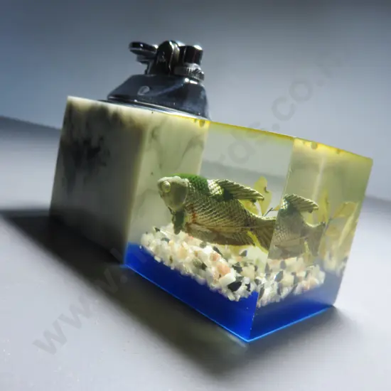 Mid-century table lighter with lucite fish decoration
