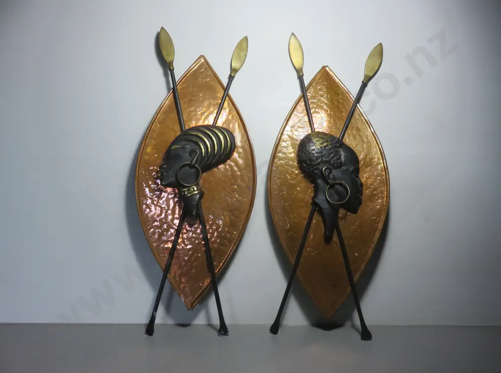 Pair of mid-century copper and brass patinated shields Image 1++