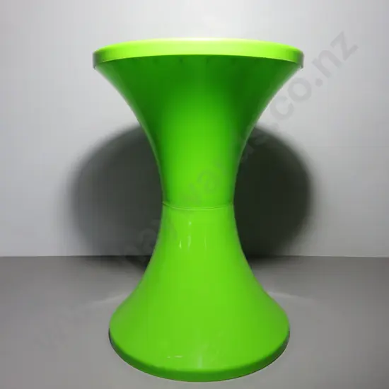 Space Age plastic stool in lime green