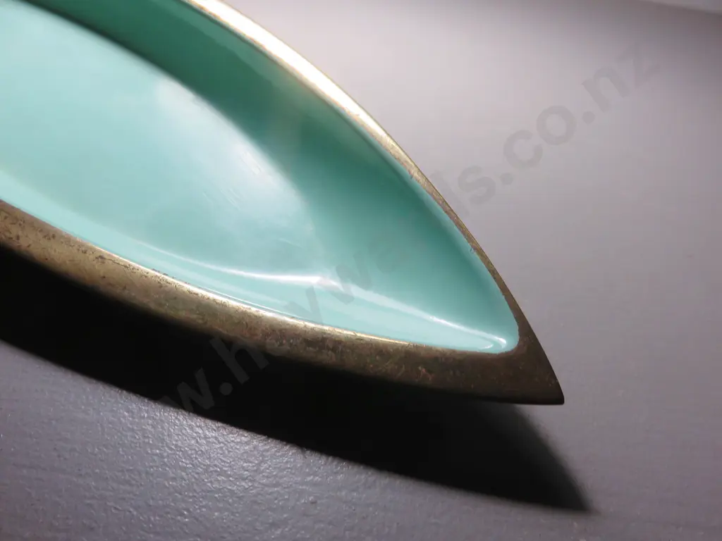 Mid-century boat shaped platter by Scandinavian studio Ystad Metall Image 1++