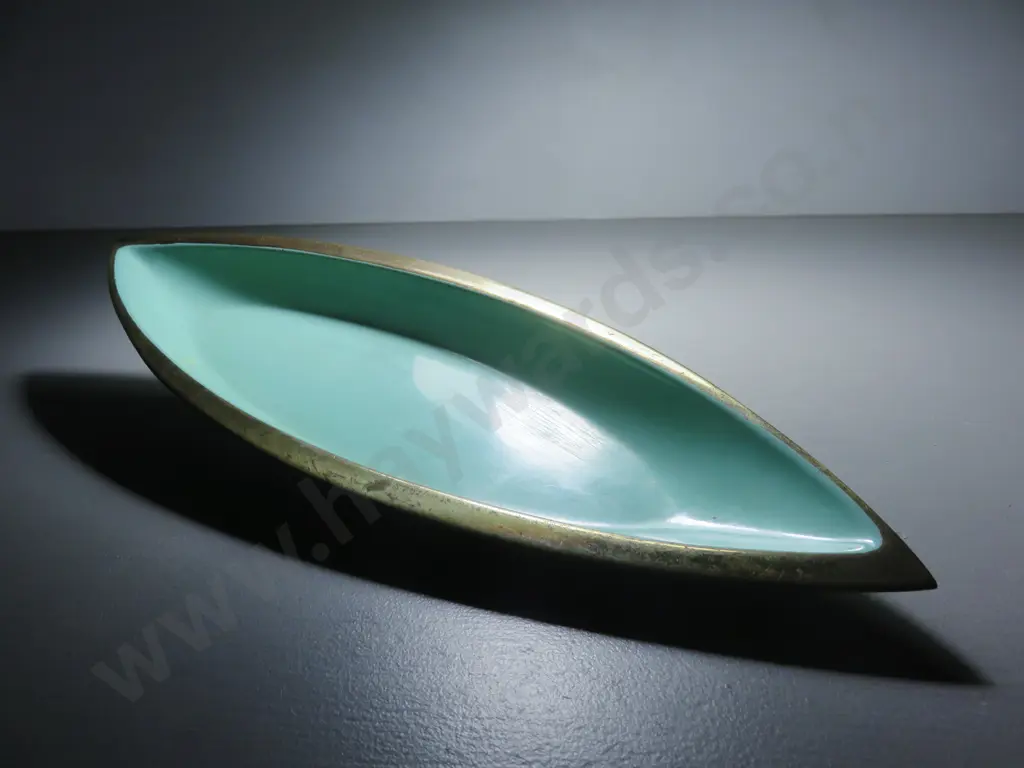 Mid-century boat shaped platter by Scandinavian studio Ystad Metall Image 1++