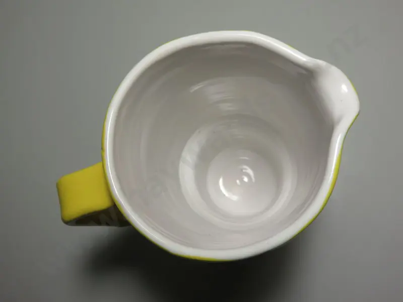 Mid-century bright yellow Italian pitcher with incised checkerboard design in burnt  Image 1++