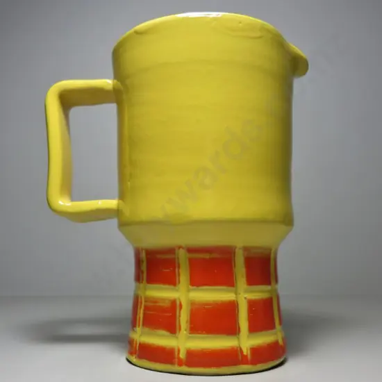 Mid-century bright yellow Italian pitcher with incised checkerboard design in burnt 