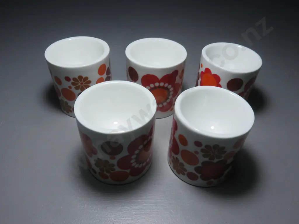 Set of five vintage “flower power” egg cups Image 1++