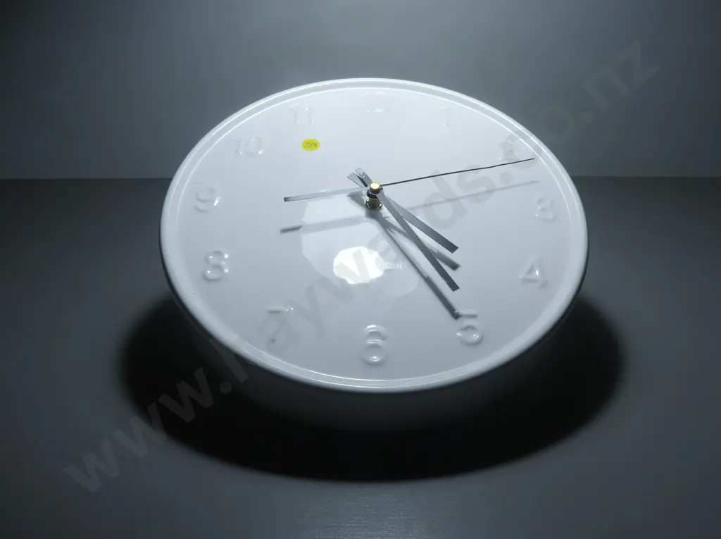 White pottery Karlsson wall clock Image 1++