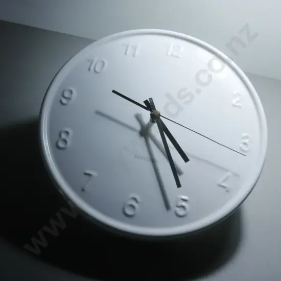 White pottery Karlsson wall clock