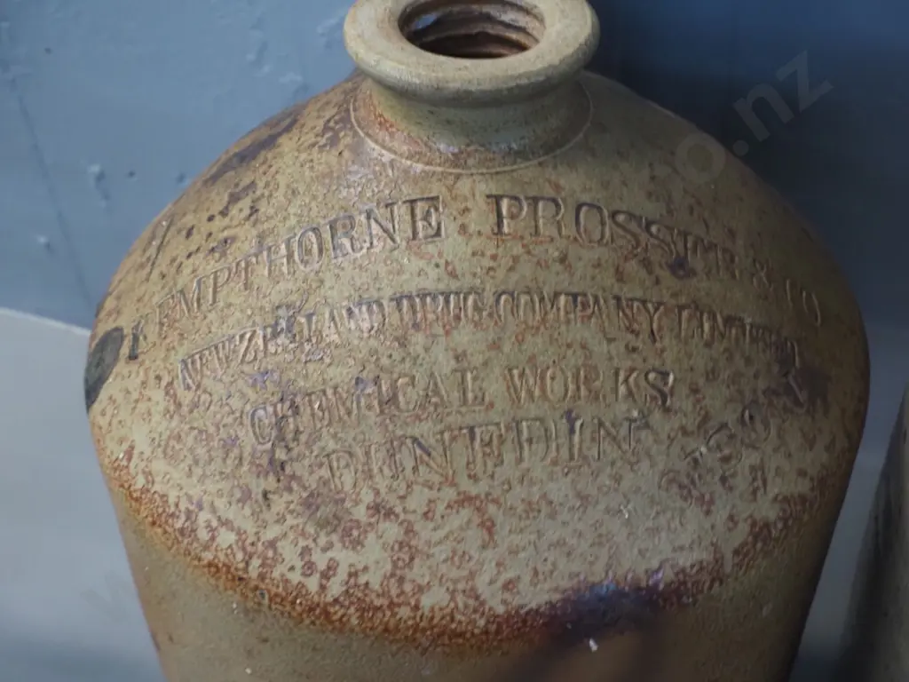2 stoneware narrow-mouth crocks - very large, no mark, H540 - and a Kempthorne Prosser Dunedin with handle broken off Image 1++