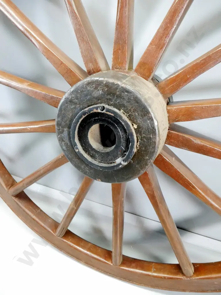 2 large dray wheels and a cast iron axle with tapered ends L-2110, Wheels have iron bands D-1490 Image 1++