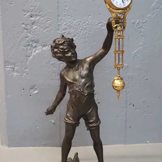vintage mystery clock - cast metal boy with bat figure, missing bat - movement recently overhauled H480