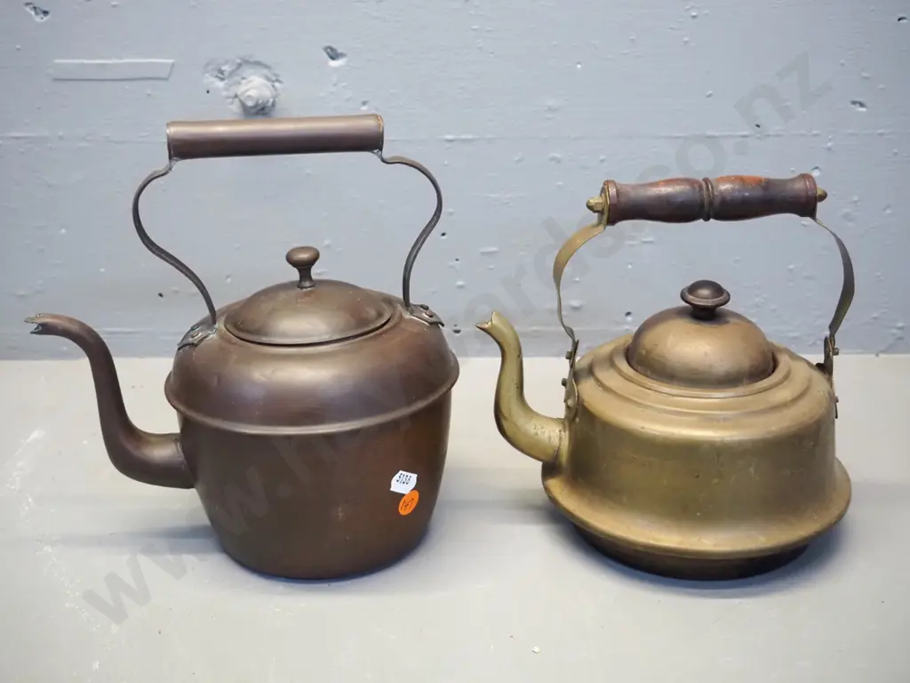 2 vintage kettles - one all copper H230 L210, some dents, and other brass with wooden handles Image 1++