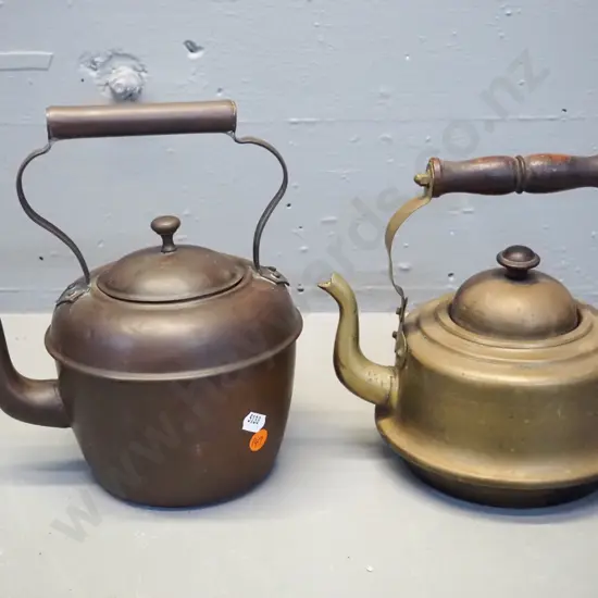 2 vintage kettles - one all copper H230 L210, some dents, and other brass with wooden handles