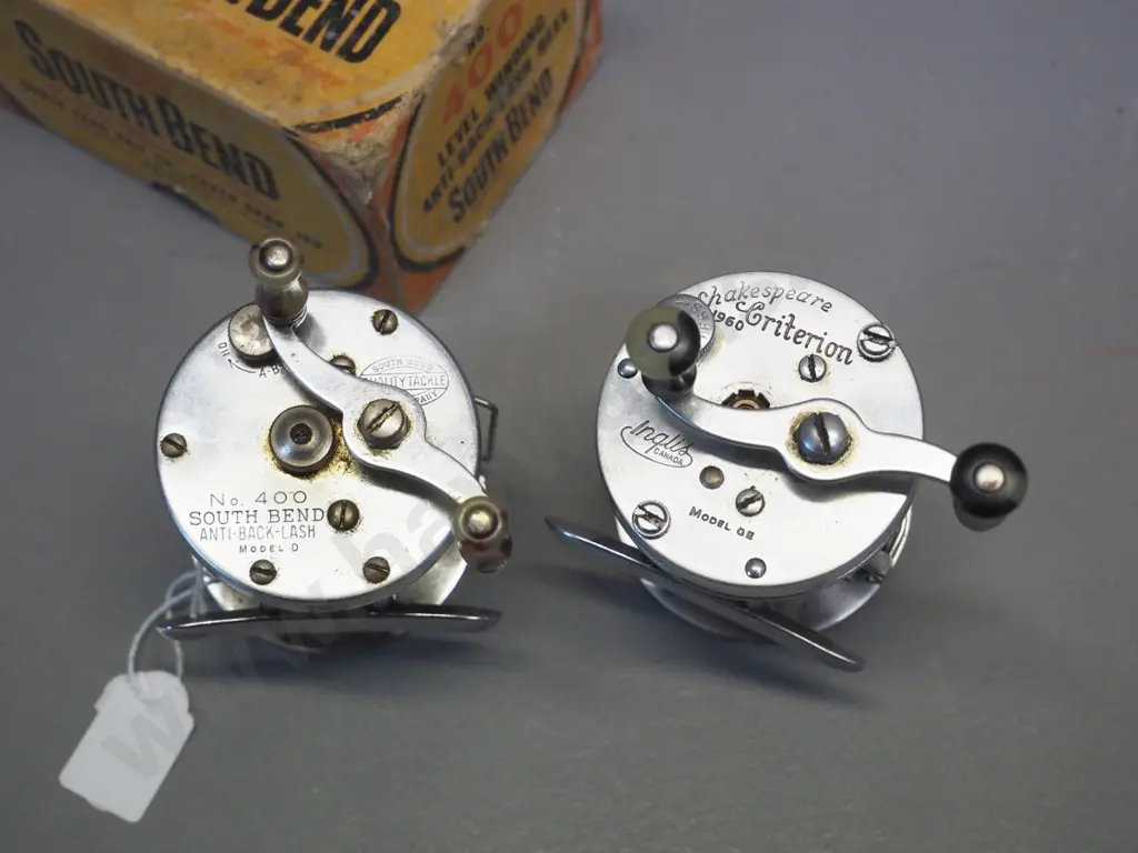 2 vintage metal fly fishing reels - boxed South Bend No. 400, made in USA & Shakespeare Criterion made in Toronto Canada Image 1++