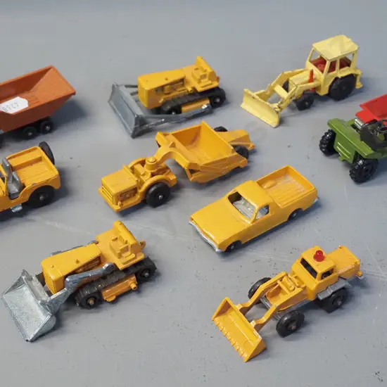 9 small die-cast vehicles - 7 Fun Ho, one Corgi and one other