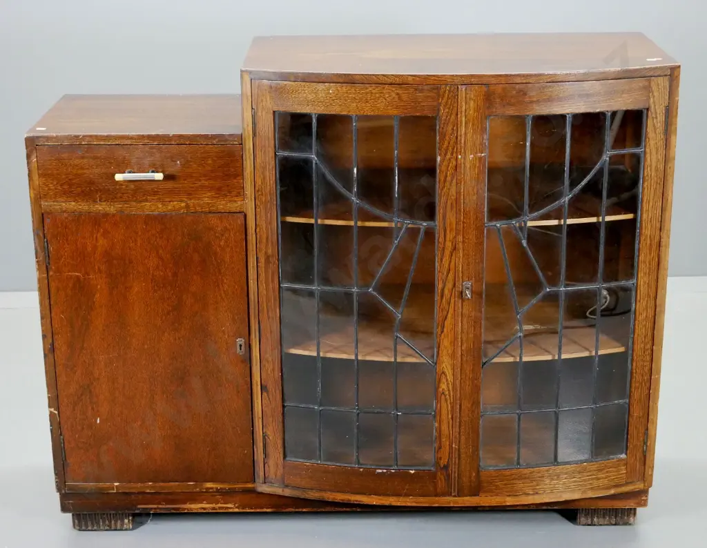 deco oak china cabinet 2 leadlight and one solid timber doors, bakelite handles, key. Polish needs attention H970 W1200 Image 1++