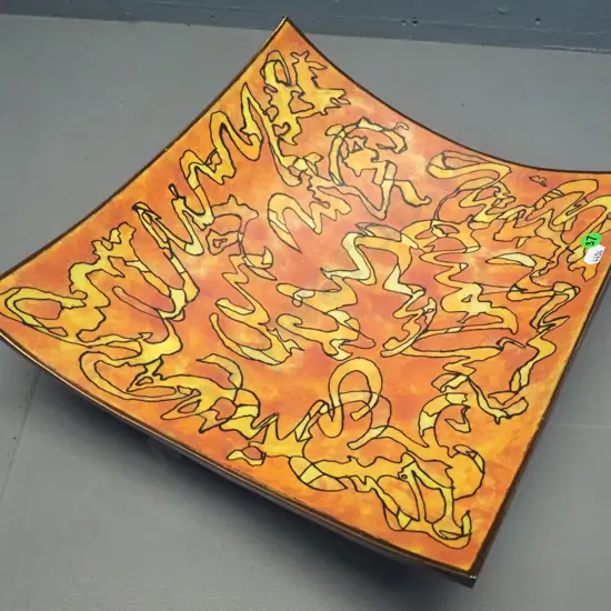 Danny Moorwood studio pottery shallow footed square bowl - black with orange and yellow motifs 330 x 330