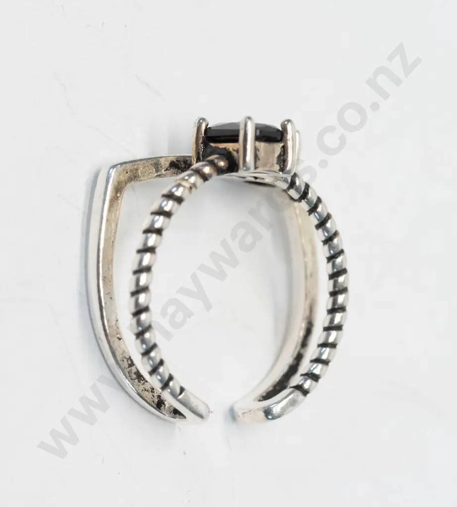 silver double ring with dark stones joined together at base stamped 925 Image 1++