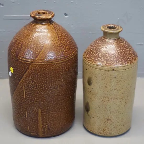 2 narrow mouth stoneware crocks, no marks but one with chip has Luke Adams written in pen on bottom H-310 D-170